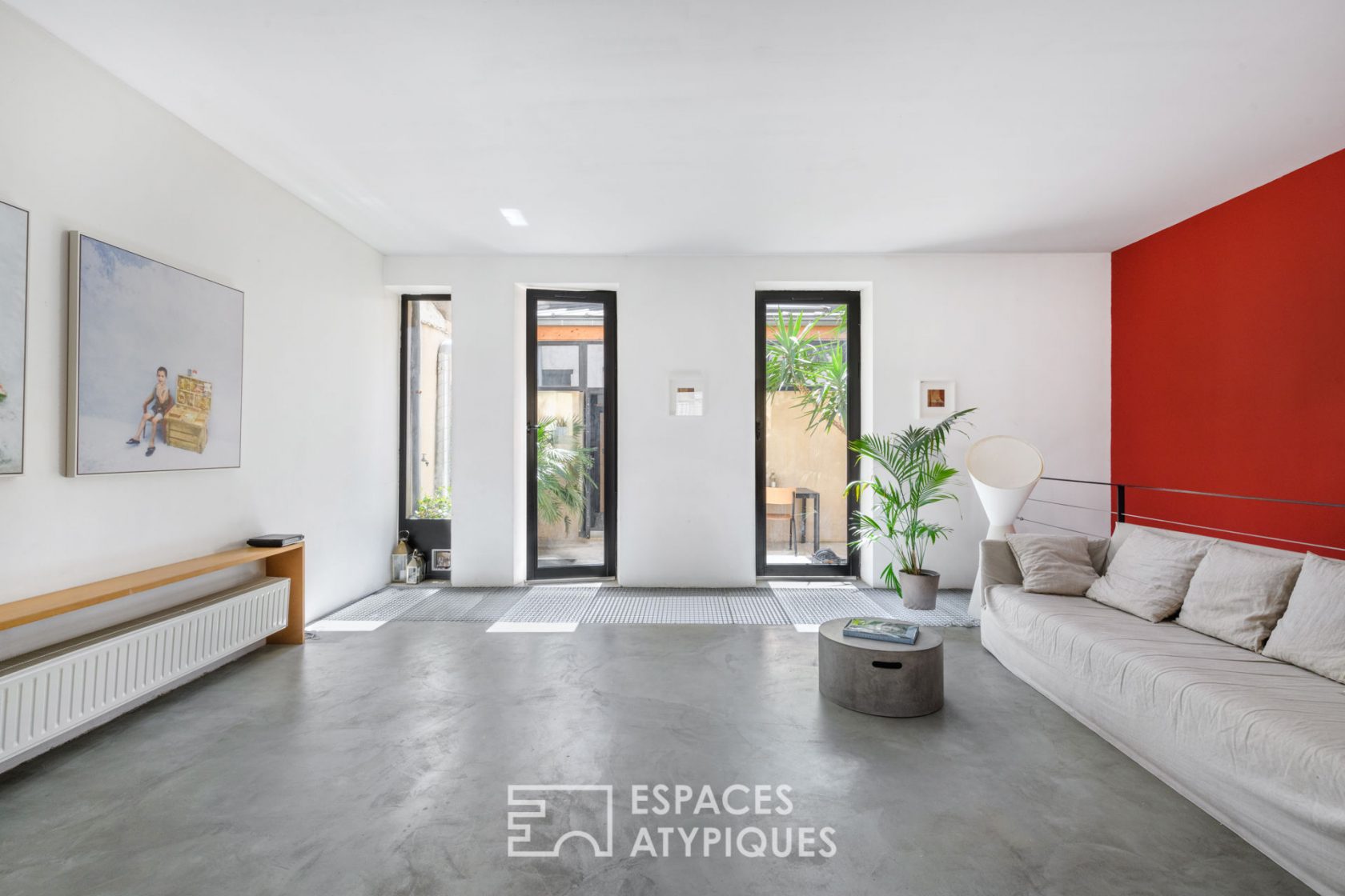 Unsuspected duplex loft with courtyard