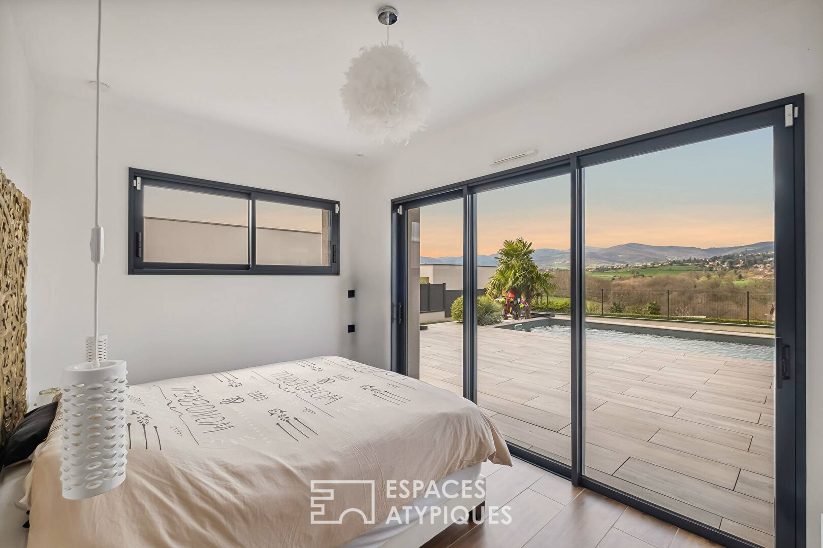 Maison contemporaine en fond d’impasse avec vue imprenable sur les monts du lyonnais