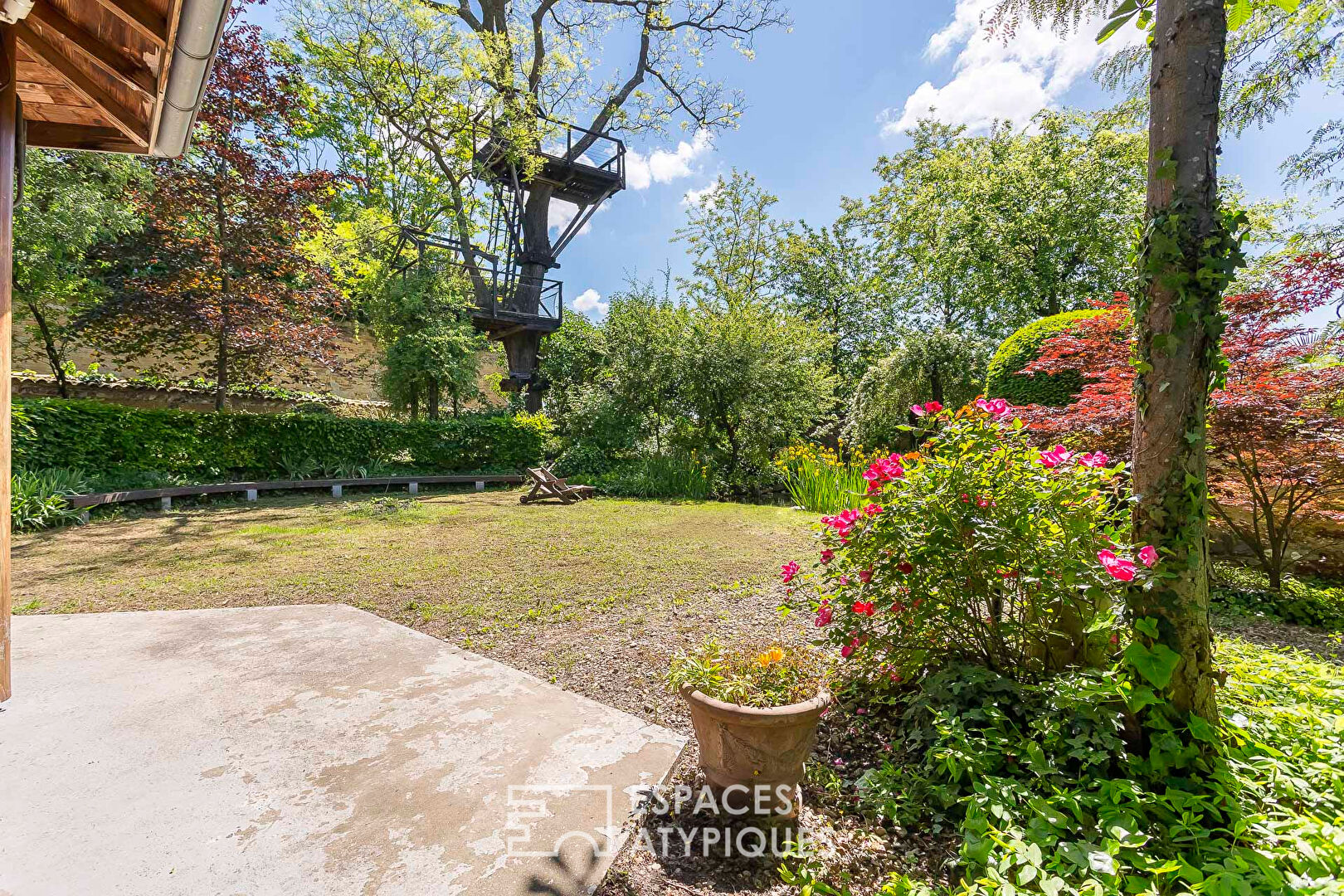 Appartement bourgeois en plein coeur de saint just avec jardin privatif