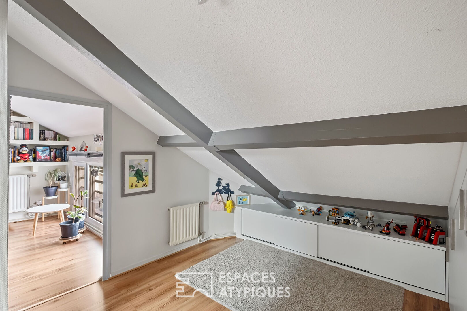 Dernier étage avec beaux volumes et terrasse