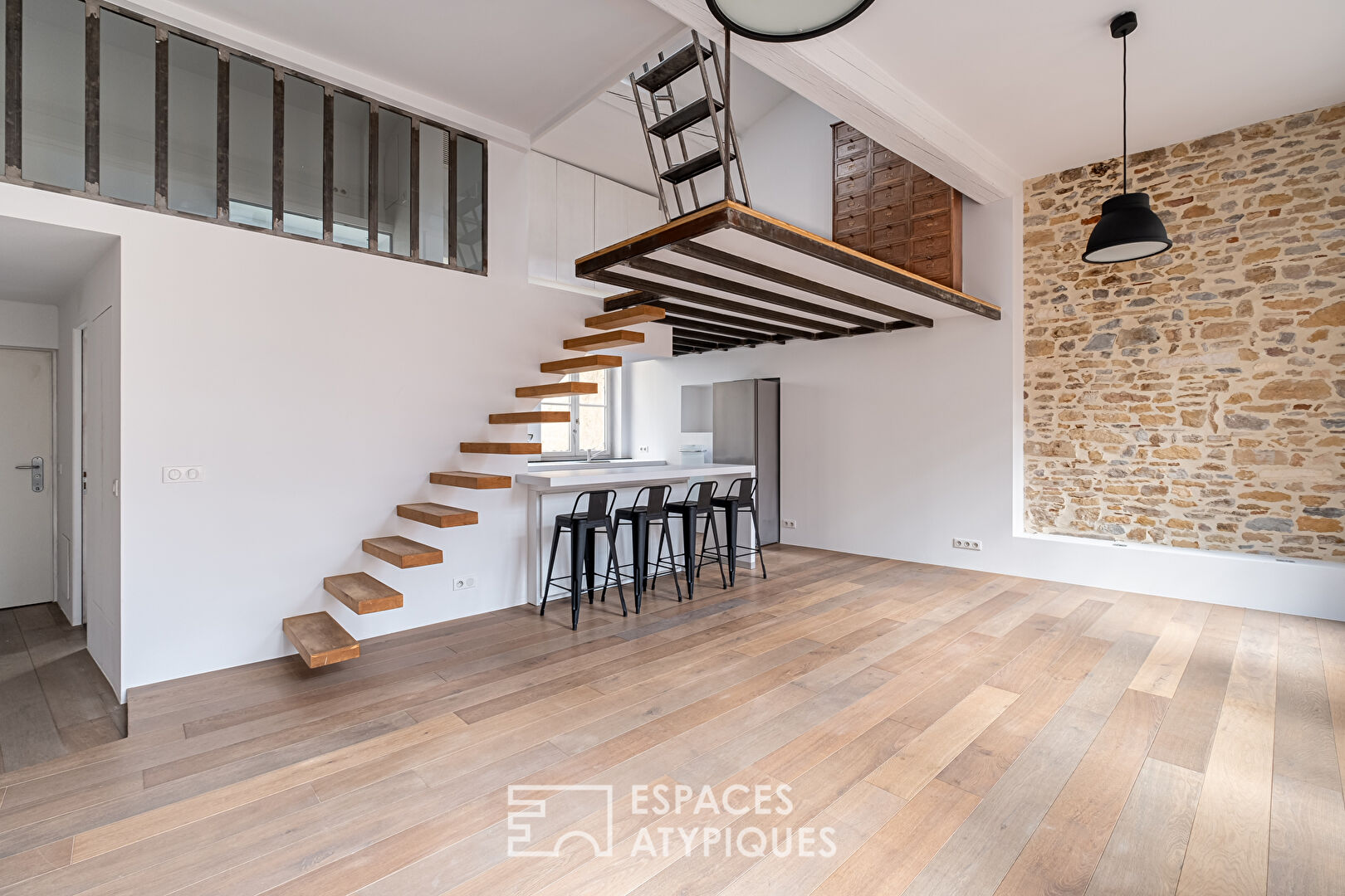 Duplex rénové en dernier étage