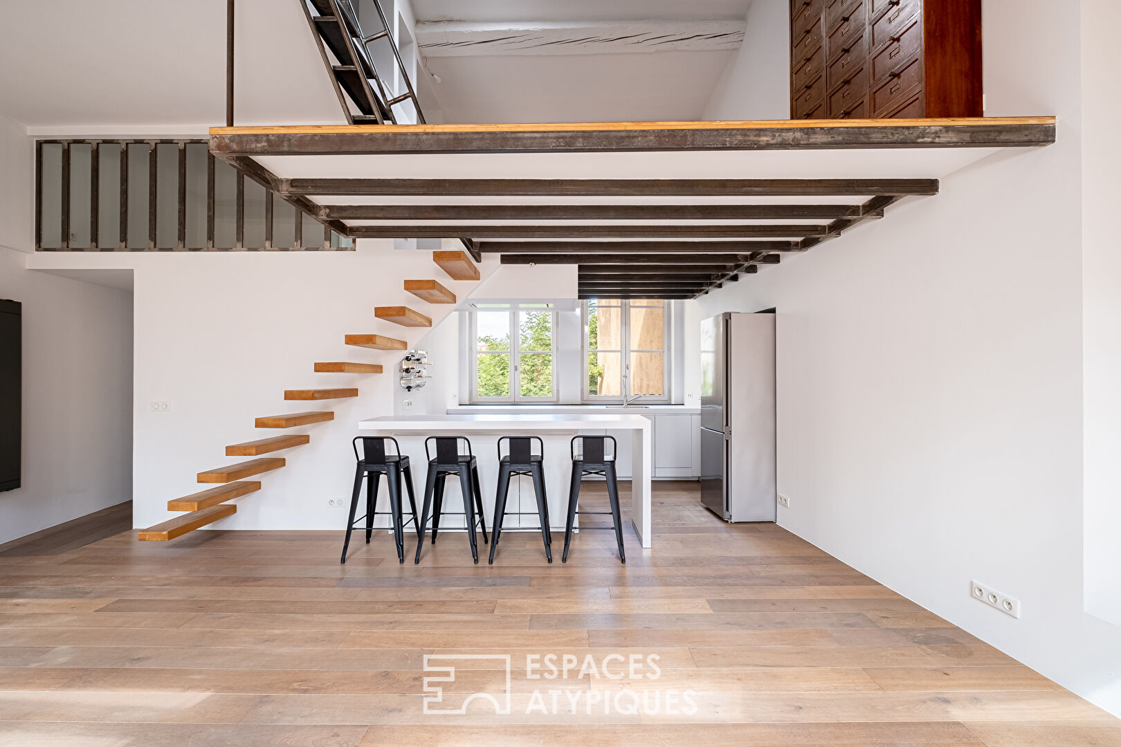 Duplex rénové en dernier étage