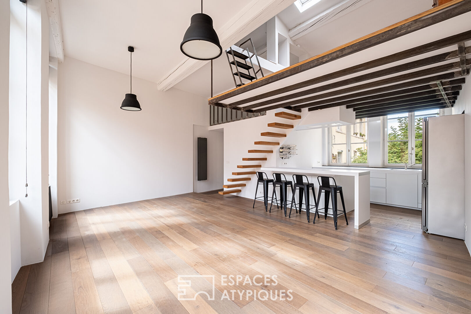 Duplex rénové en dernier étage