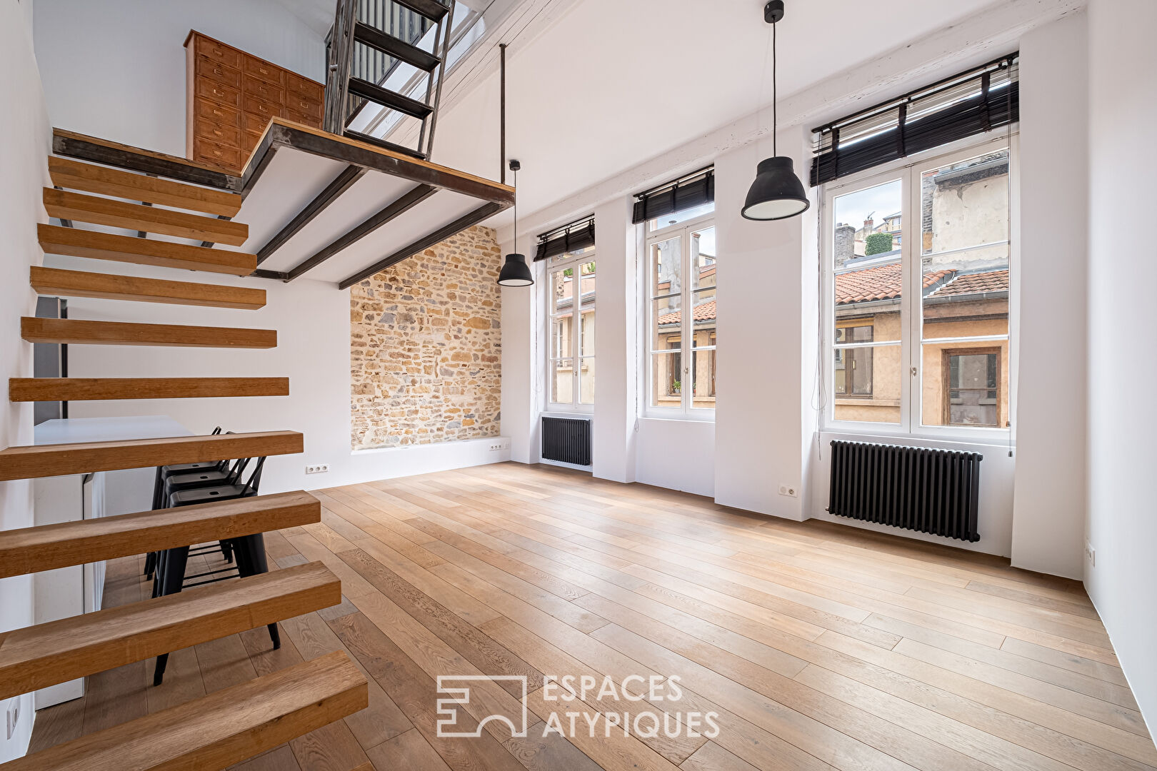 Duplex rénové en dernier étage