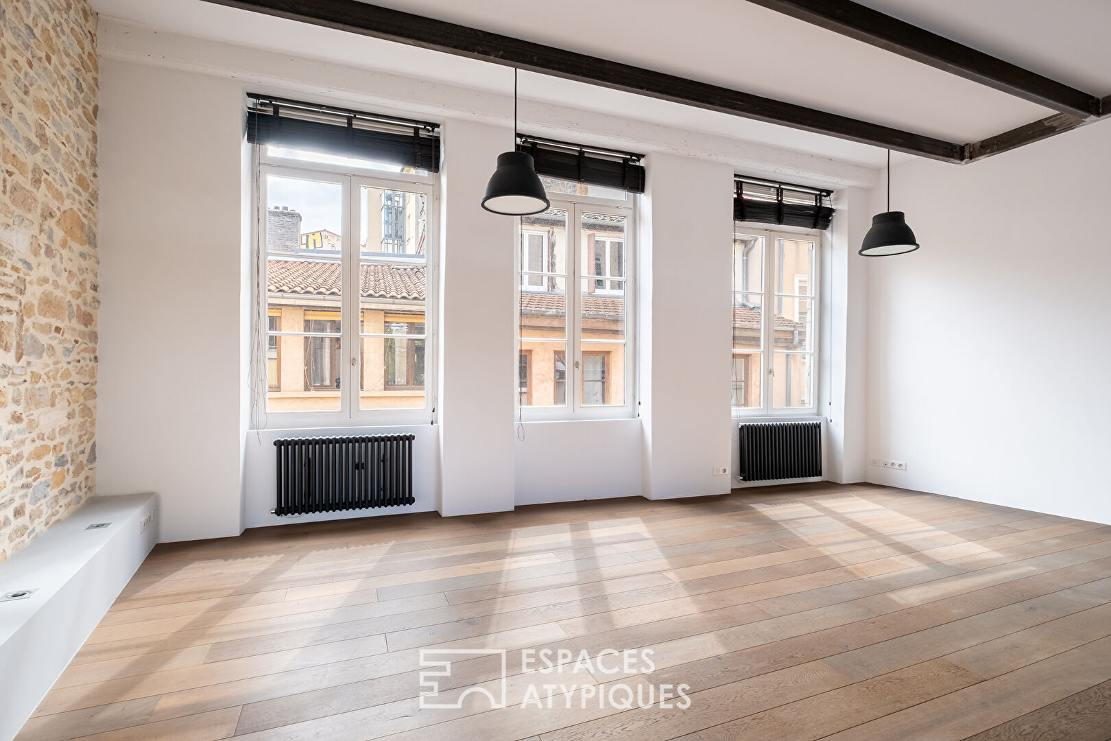 Duplex rénové en dernier étage