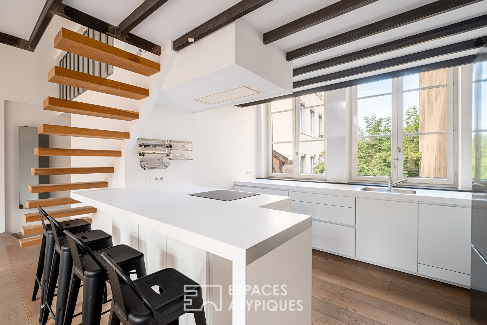 Duplex rénové en dernier étage