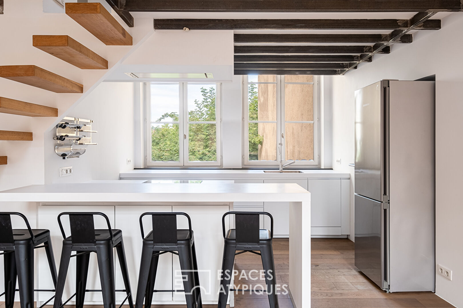 Duplex rénové en dernier étage