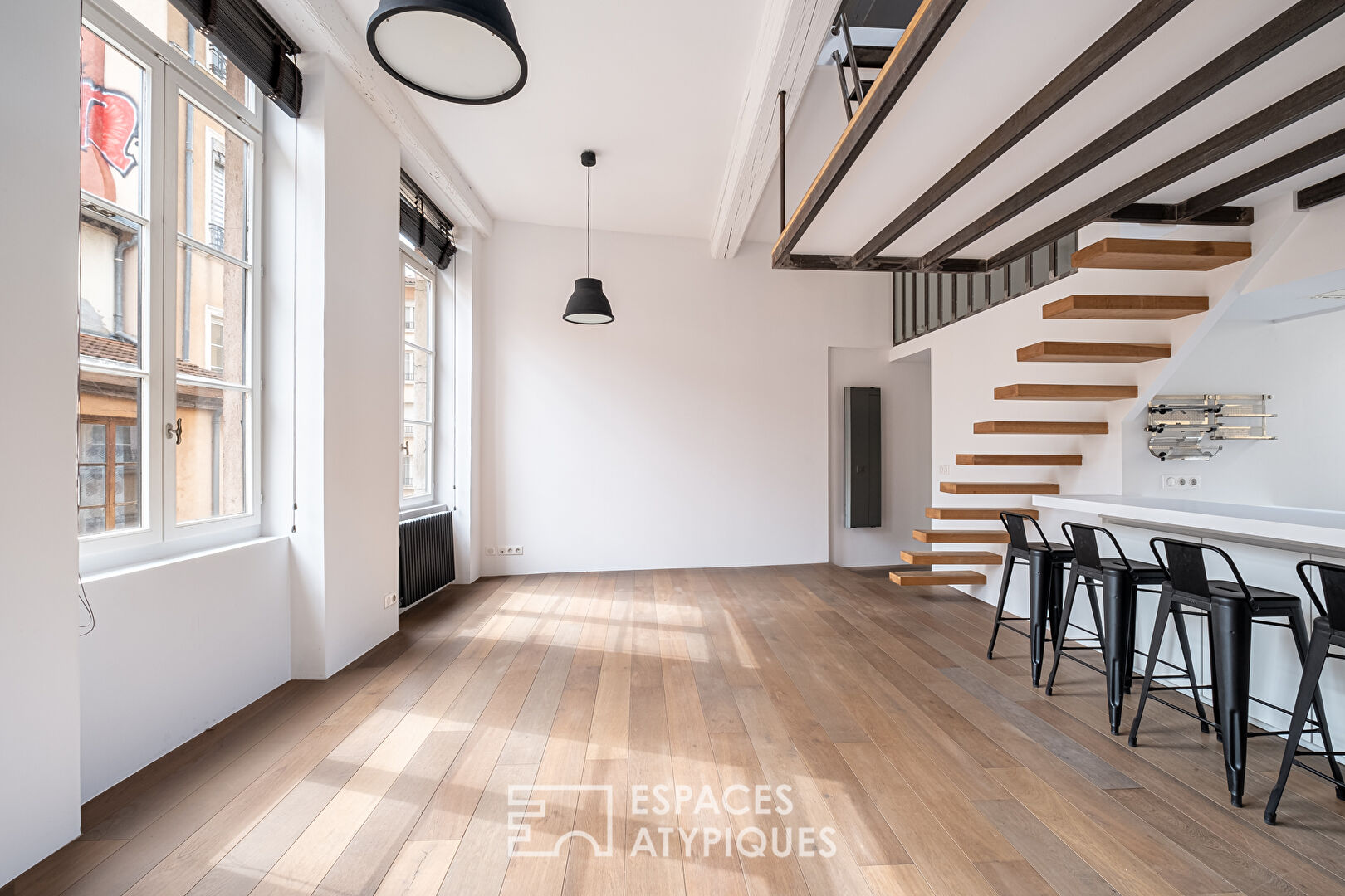 Duplex rénové en dernier étage