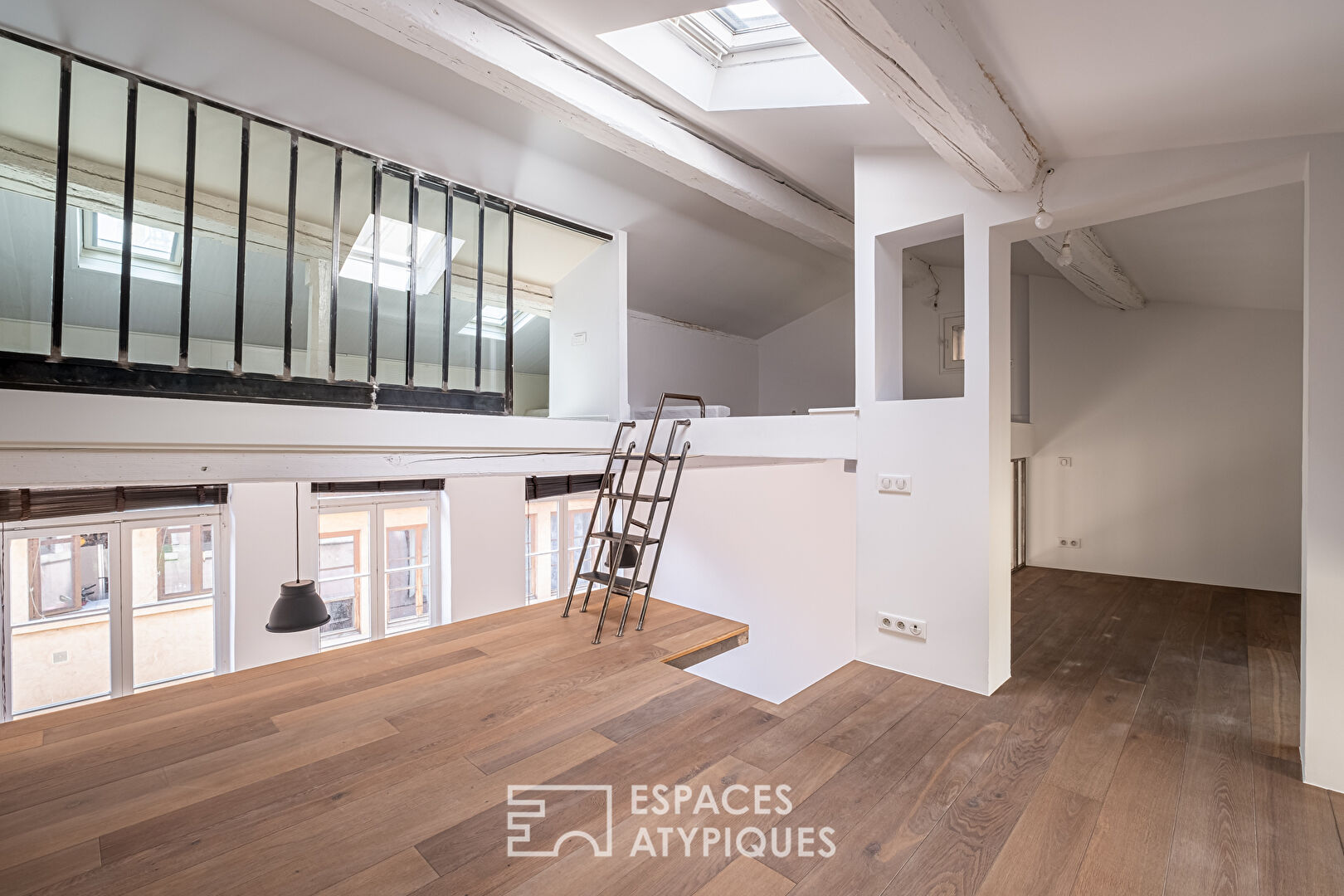 Duplex rénové en dernier étage