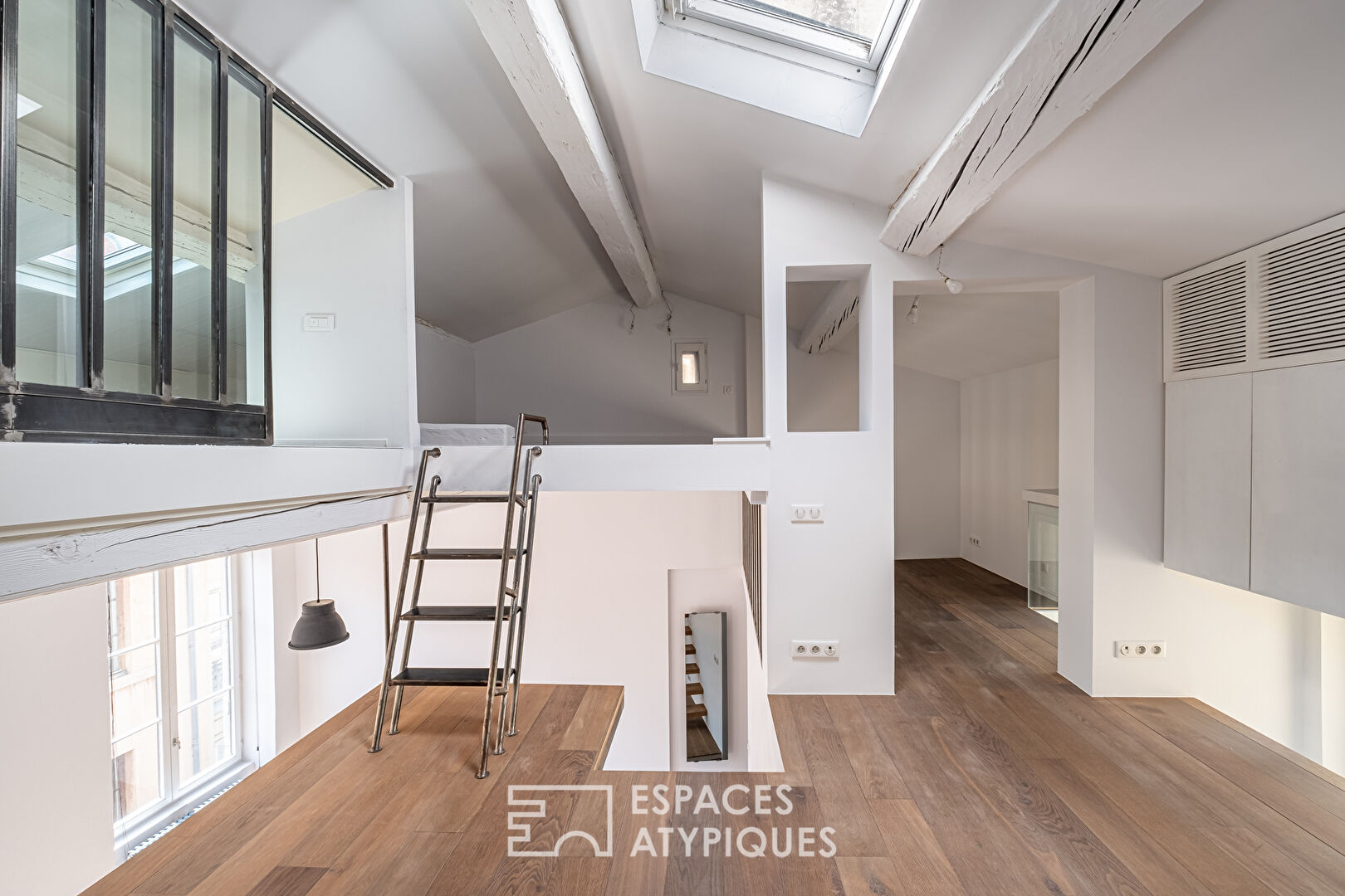 Duplex rénové en dernier étage