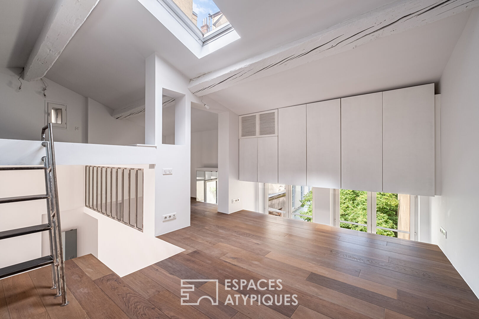 Duplex rénové en dernier étage