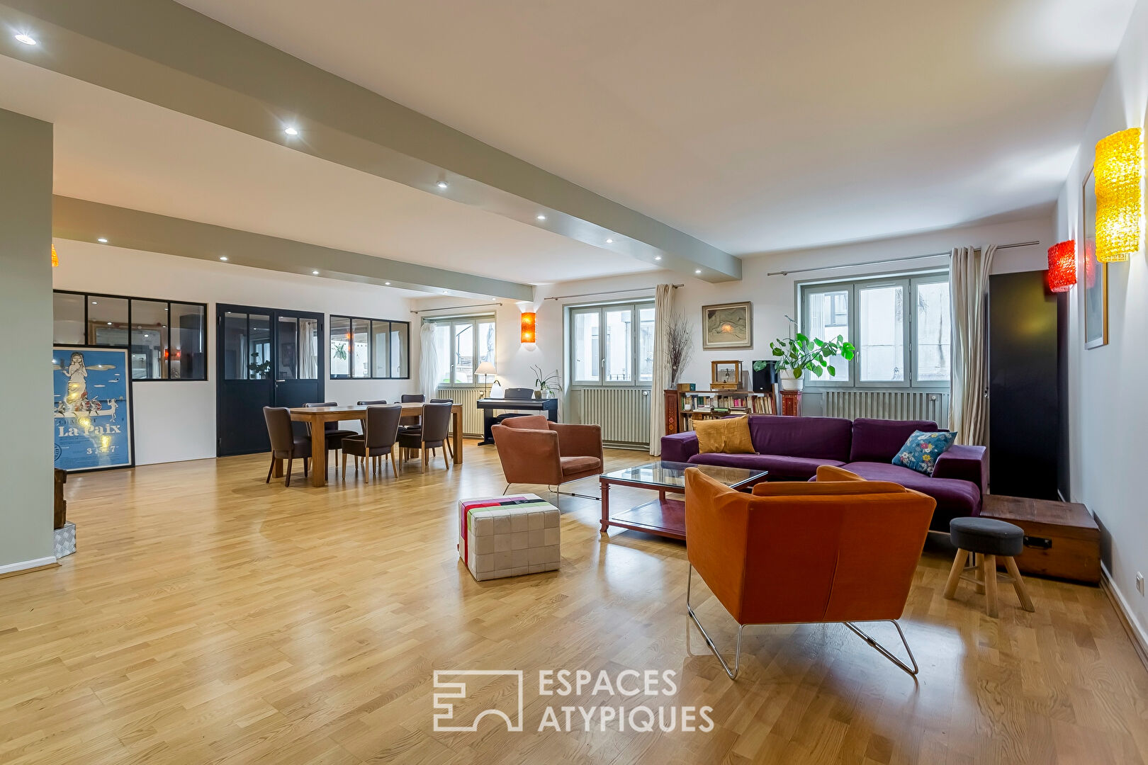 Appartement type Loft avec terrasse et parking sur les quais de Saône