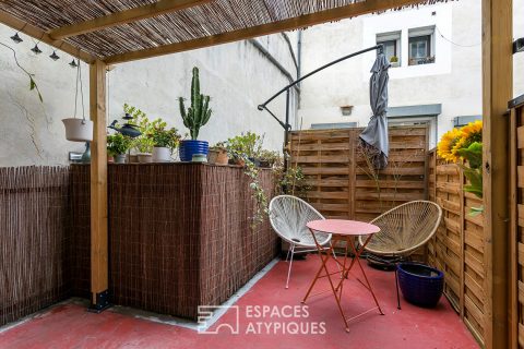 Appartement type Loft avec terrasse et parking sur les quais de Saône