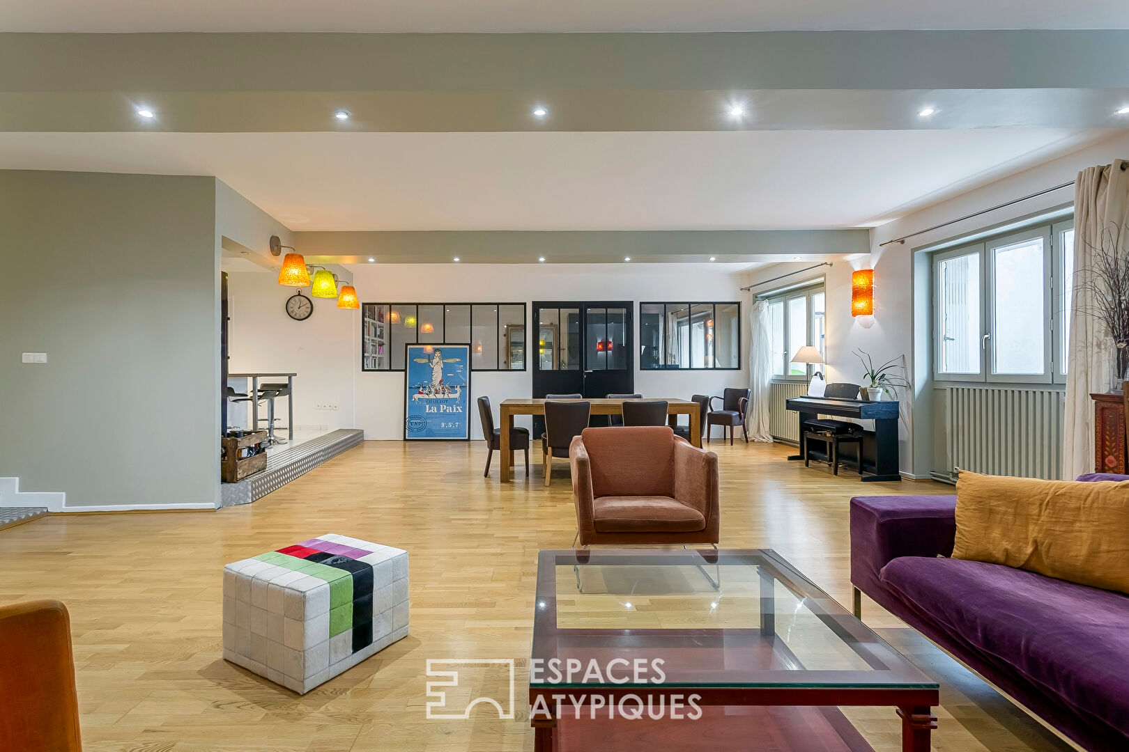 Appartement type Loft avec terrasse et parking sur les quais de Saône