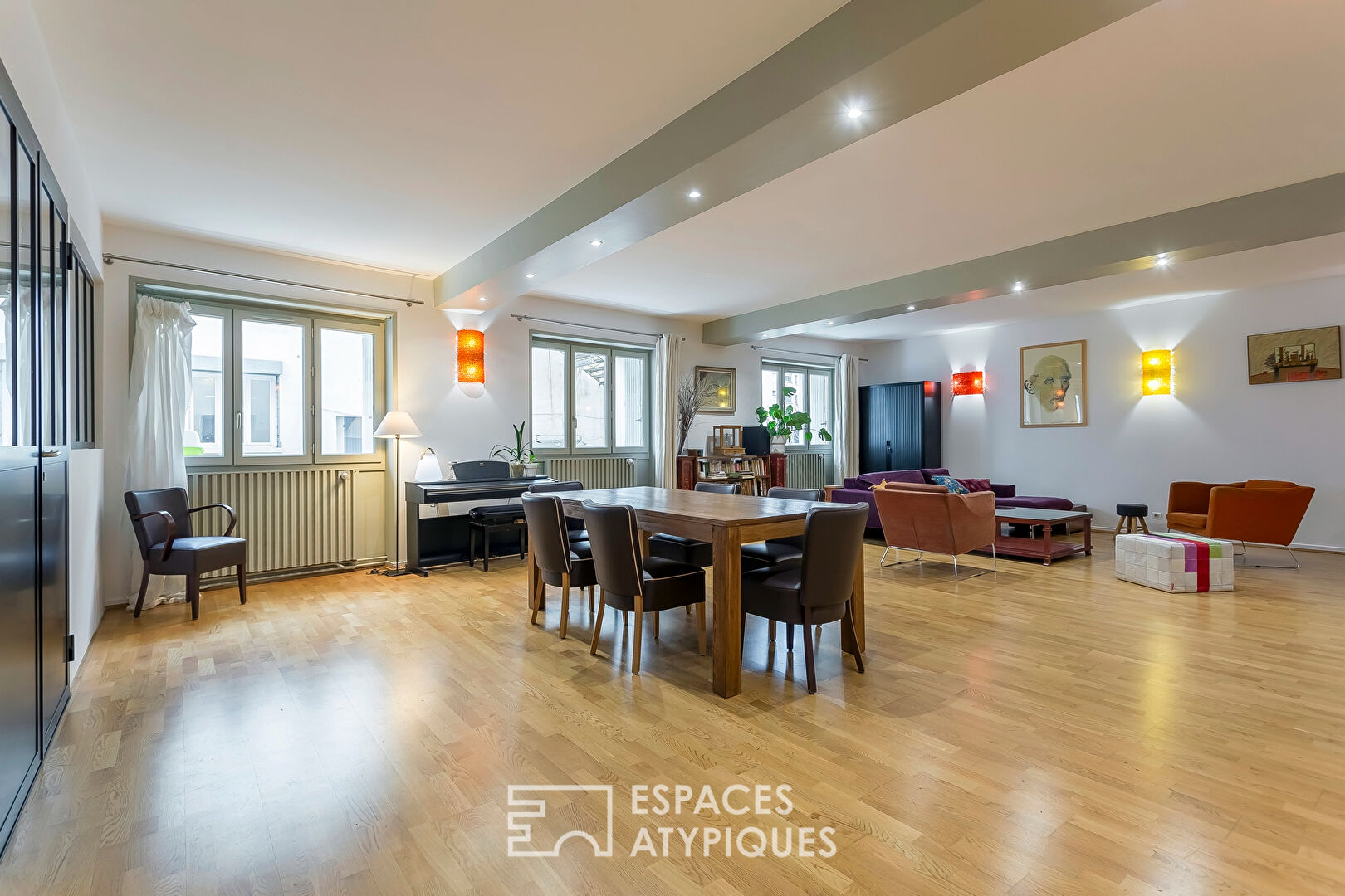 Appartement type Loft avec terrasse et parking sur les quais de Saône
