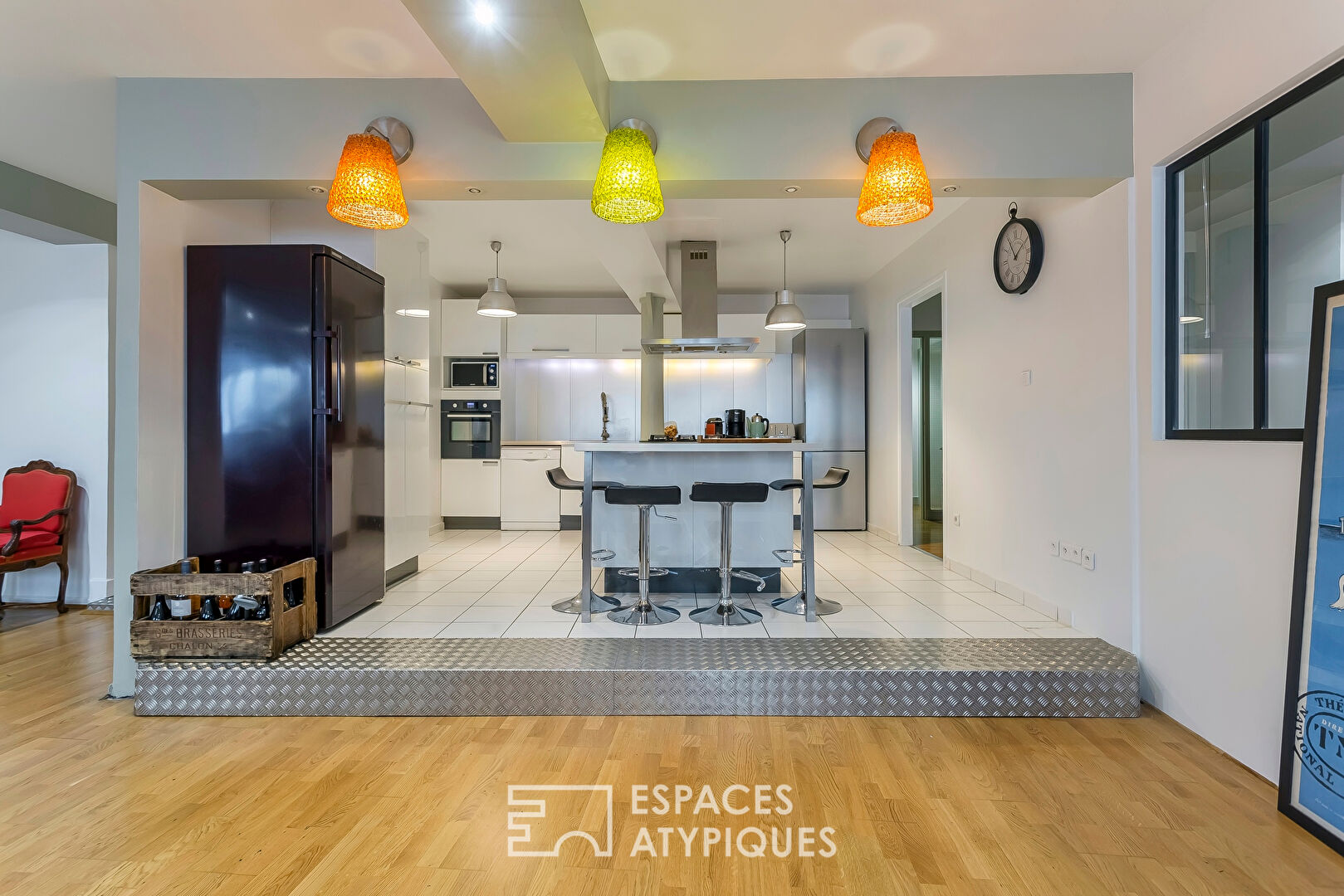 Appartement type Loft avec terrasse et parking sur les quais de Saône