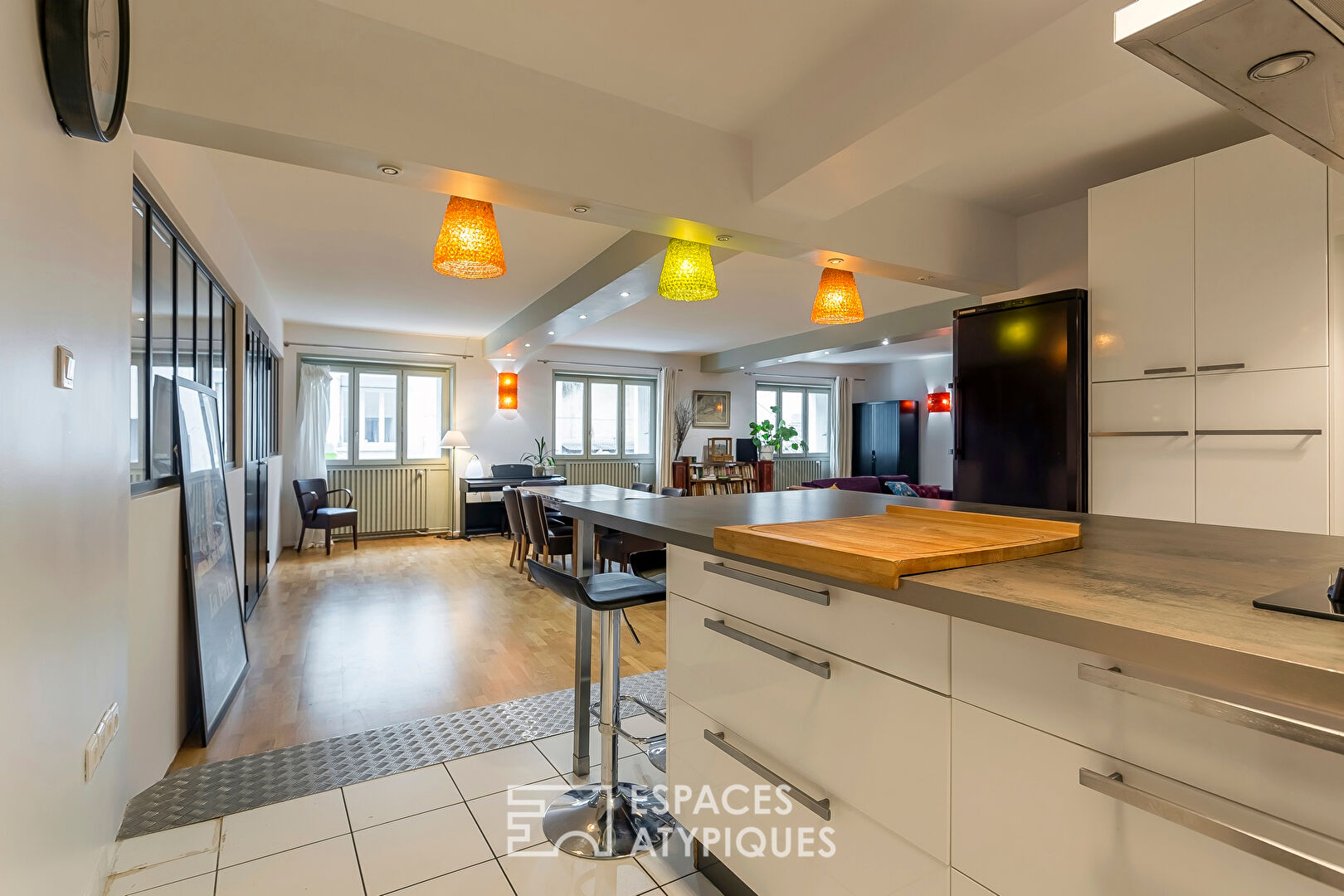 Appartement type Loft avec terrasse et parking sur les quais de Saône
