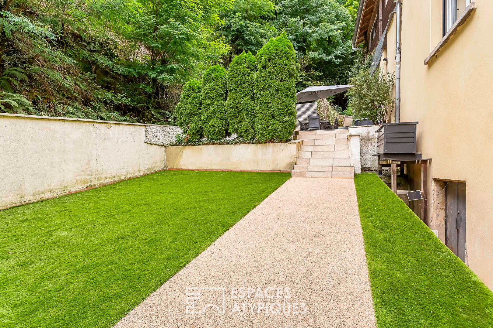 Appartement rénové dans un ancien moulin avec terrasse