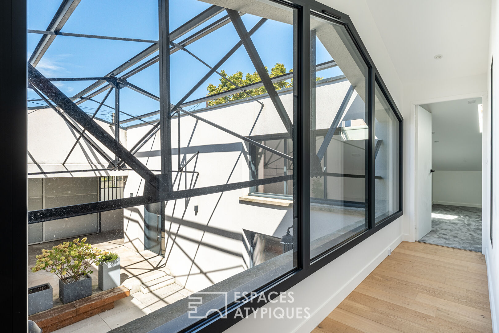 Industrial loft-style house with patio