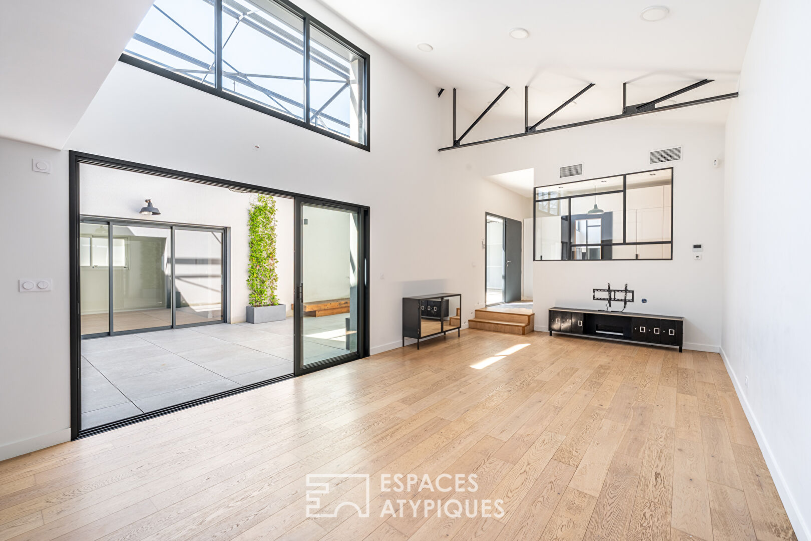 Industrial loft-style house with patio