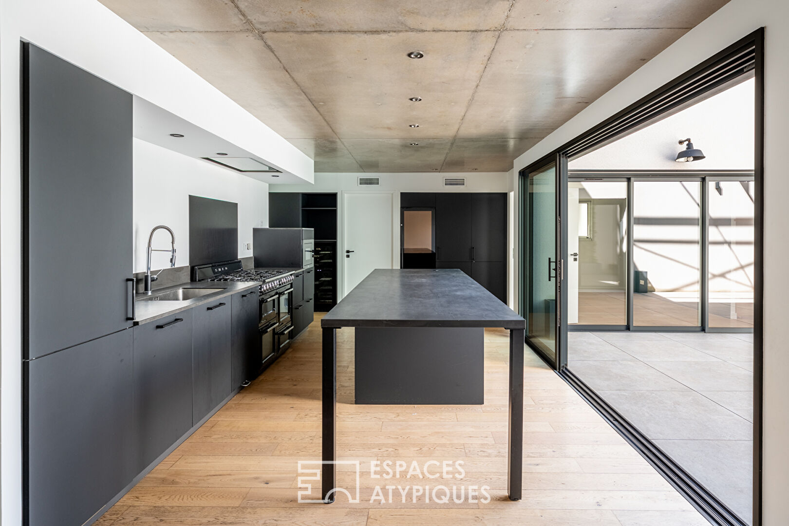 Industrial loft-style house with patio
