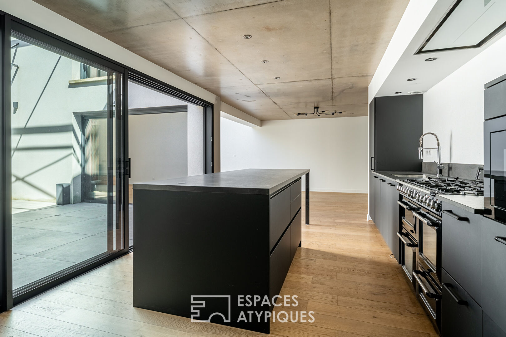 Industrial loft-style house with patio