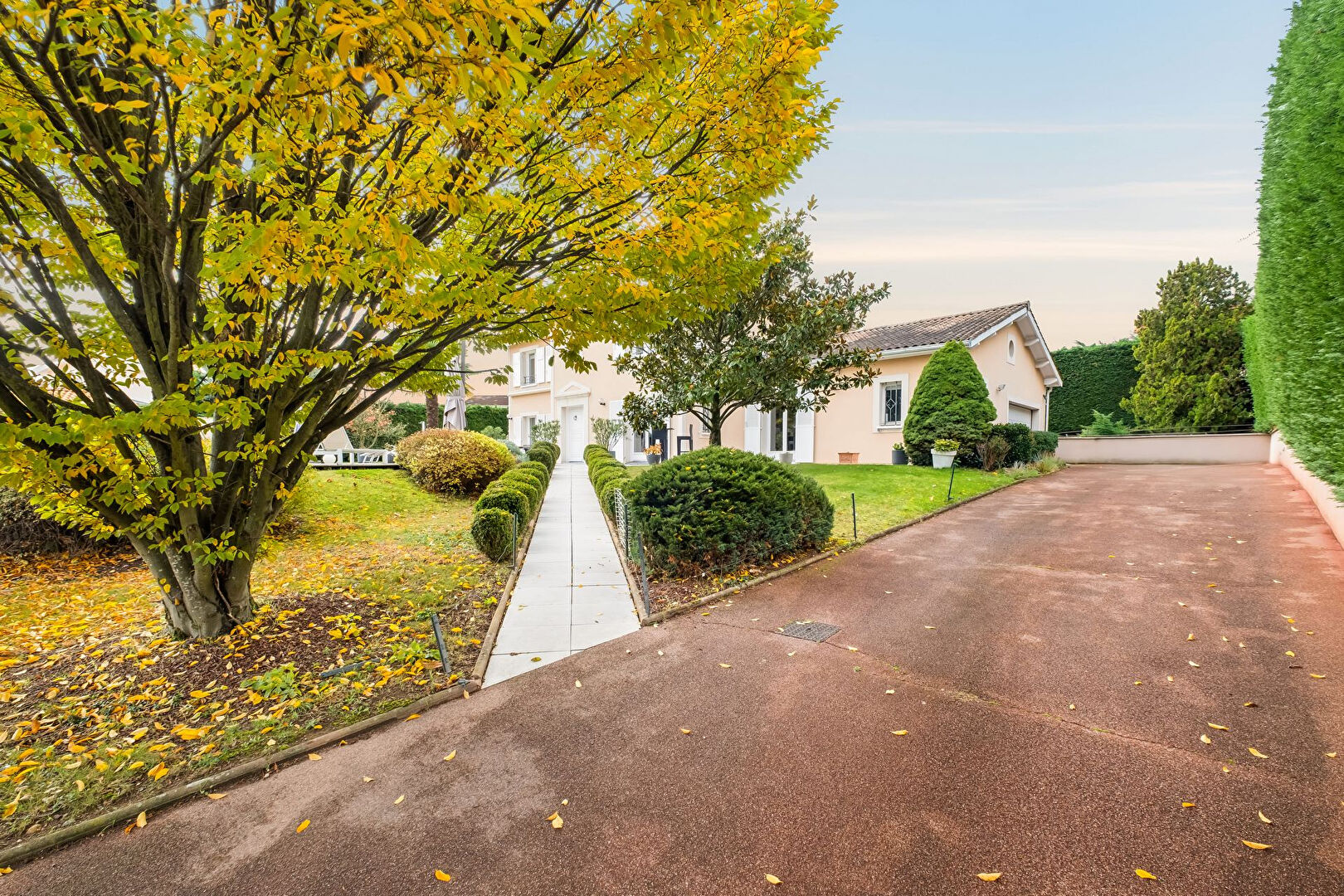 Bright house with swimming pool and tennis court in a green setting with no overlooking neighbors.