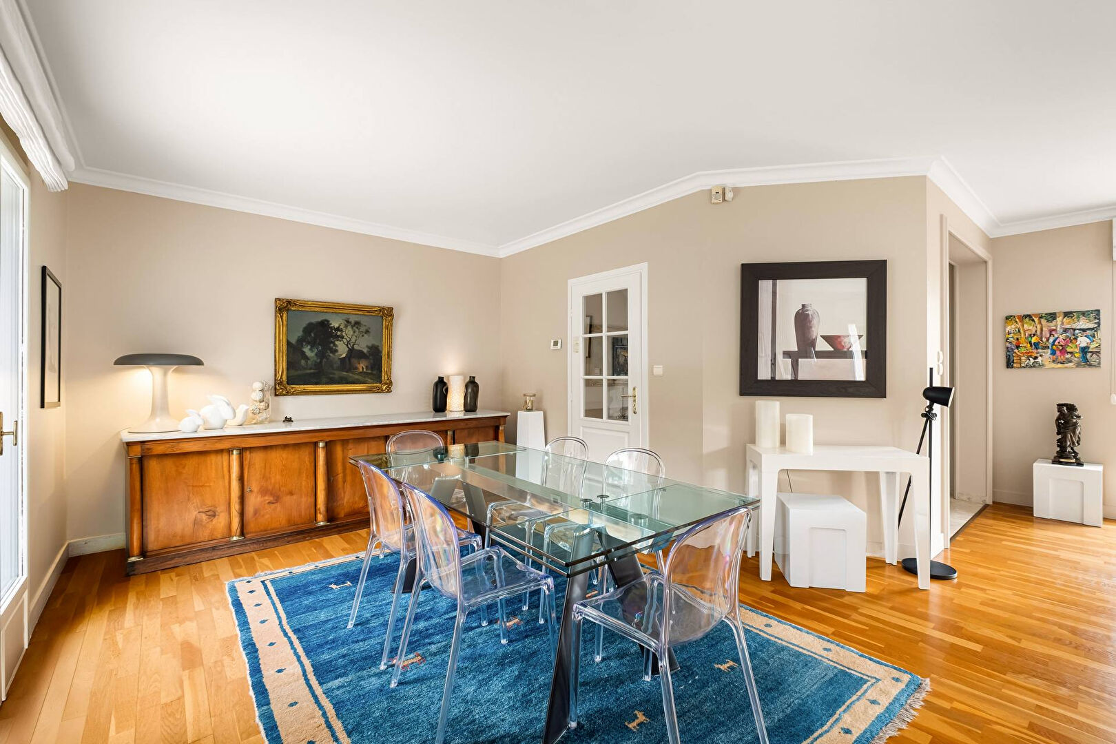 Bright house with swimming pool and tennis court in a green setting with no overlooking neighbors.