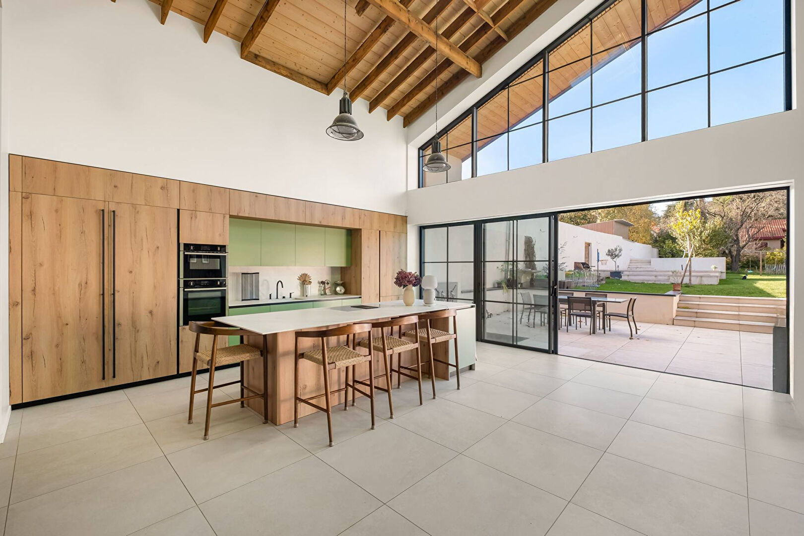 The rebirth of a factory into an architect-designed house in the heart of Charly