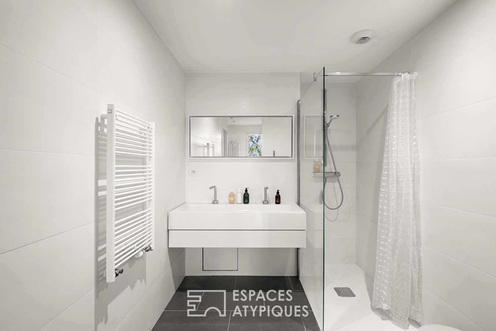 Duplex en rez-de-jardin dans une copropriété exclusive