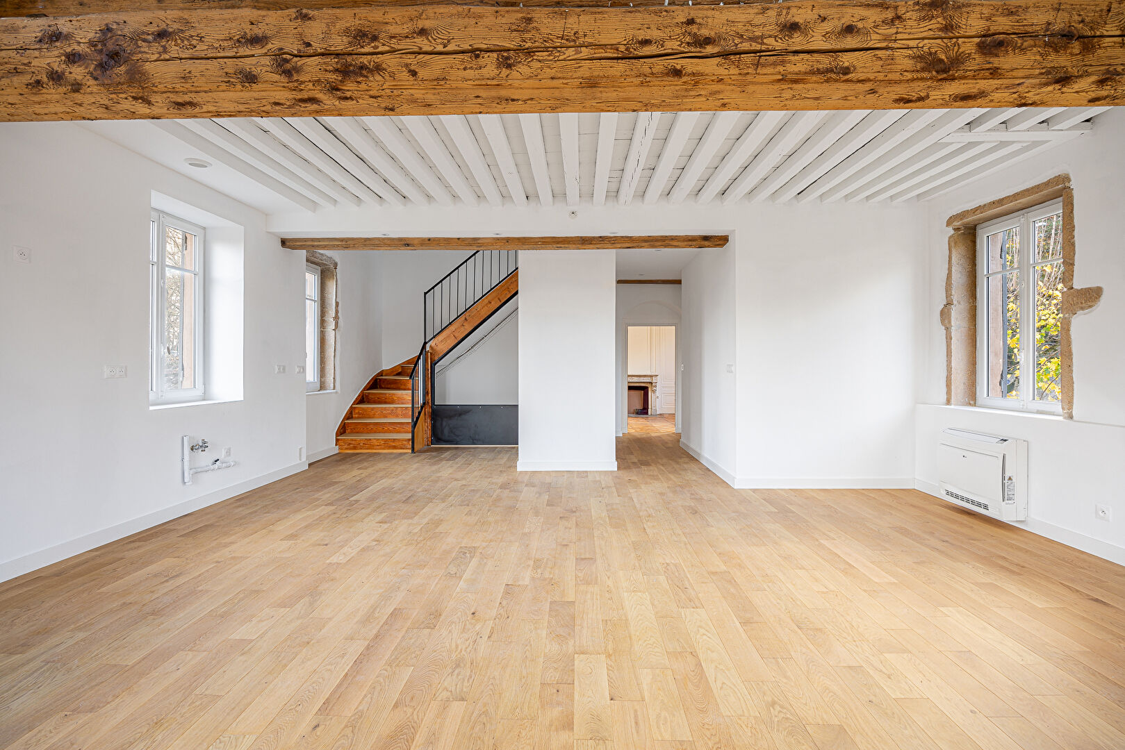 Un duplex comme une maison avec jardin et balcon
