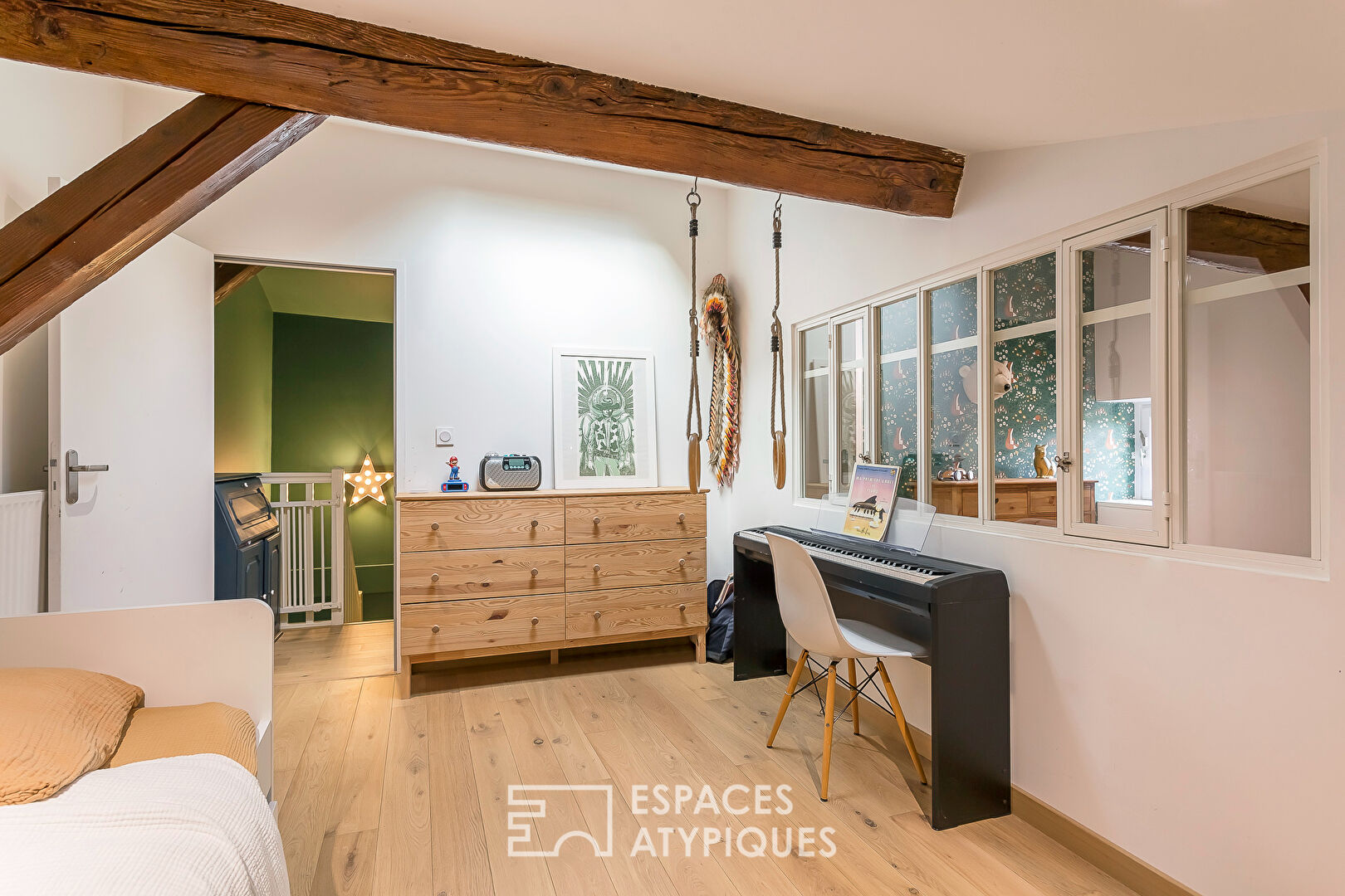 Duplex de caractère au dernier étage desservi par ascenseur