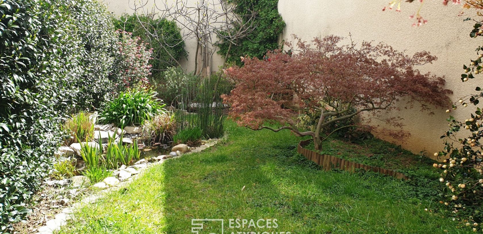 Rez-de-jardin avec 242m2 de jardin