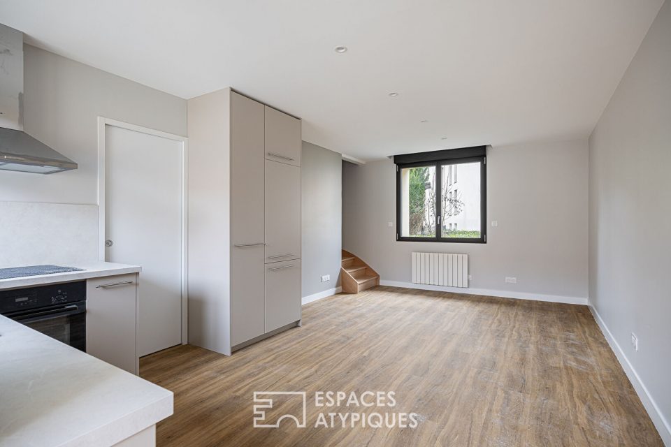 Duplex rénové en dernier étage