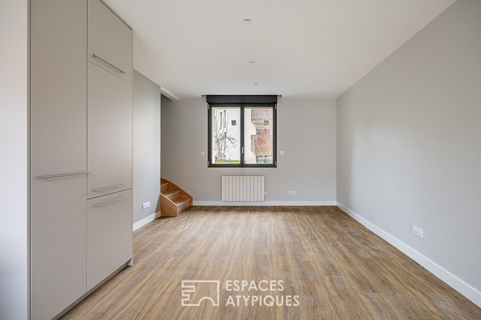 Duplex rénové en dernier étage