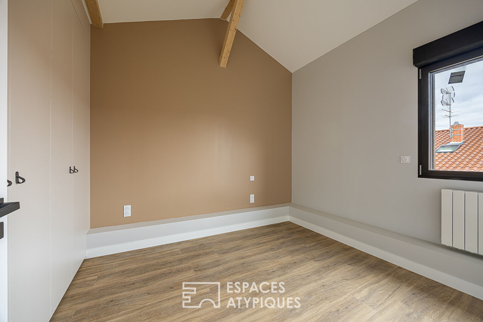 Duplex rénové en dernier étage