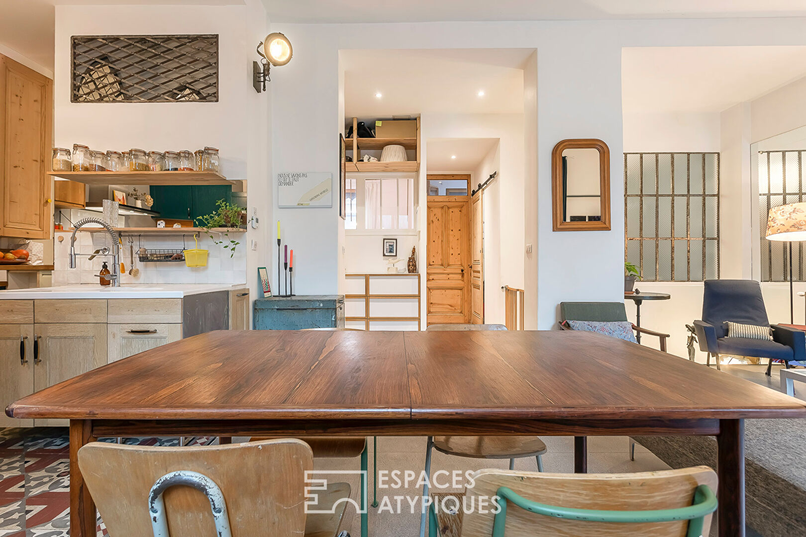 Appartement en rez de jardin esprit maison avec véranda