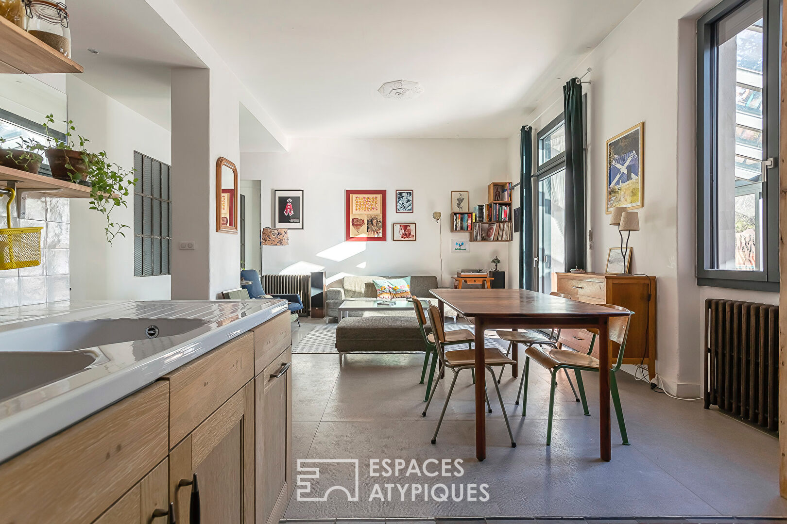 Appartement en rez de jardin esprit maison avec véranda