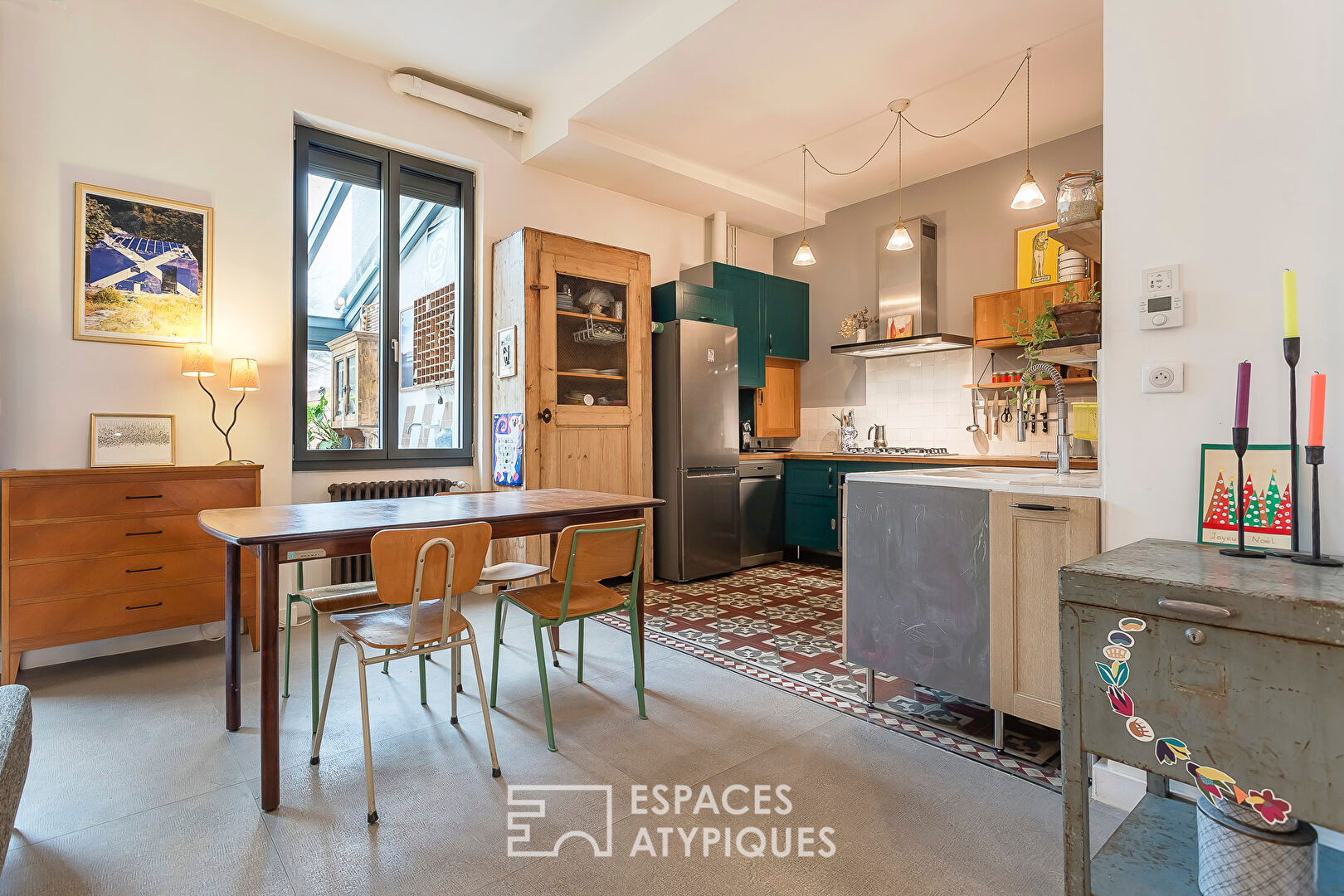 Appartement en rez de jardin esprit maison avec véranda