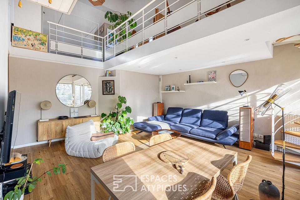 Double hauteur et terrasses en dernier étage à deux pas du Rhône