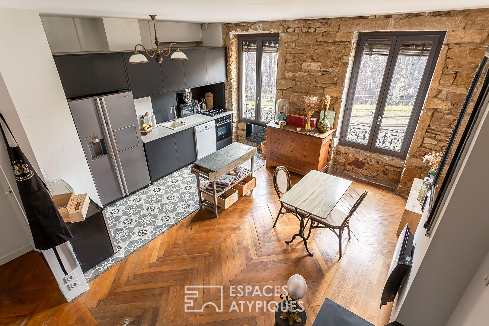 Duplex de caractère au dernier étage avec ascenseur et vue Saône