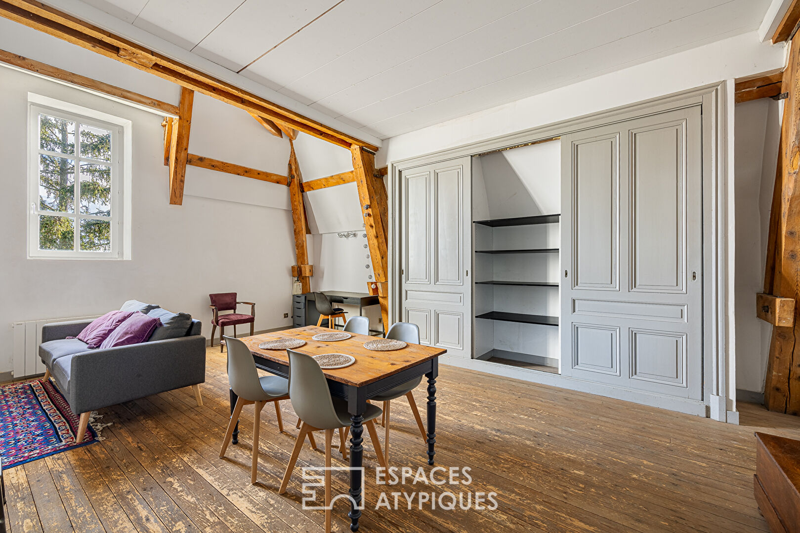 Duplex de caractère dans une bâtisse ancienne