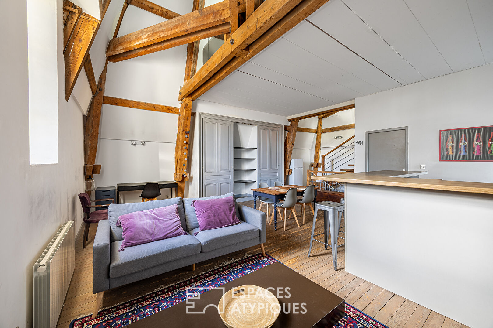 Duplex de caractère dans une bâtisse ancienne