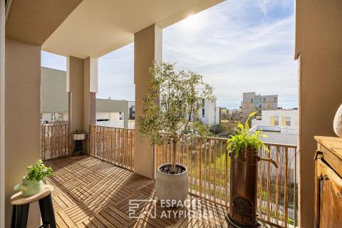Appartement avec terrasse au dernier étage dans un immeuble contemporain