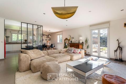 Maison avec jardin paysagé et piscine