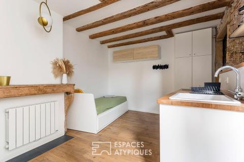 Studio rénové avec pierres apparentes au coeur de Saint-Paul