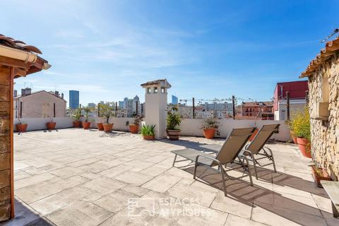 Appartement rénové en dernier étage avec une terrasse plein ciel de 122m2