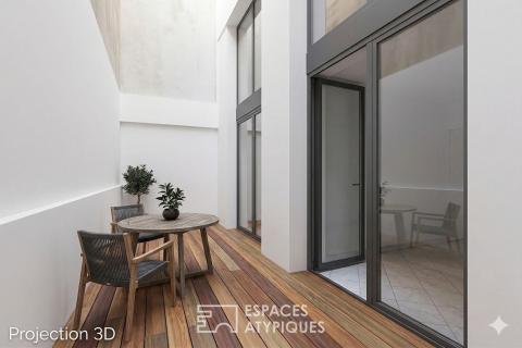 Loft en plateau à rénover avec cour privative