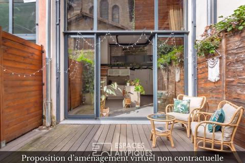 Loft avec terrasse dans un ancien atelier
