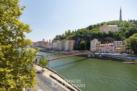 Appartement à l&rsquo;élégance architecturale suspendue sur la Saône